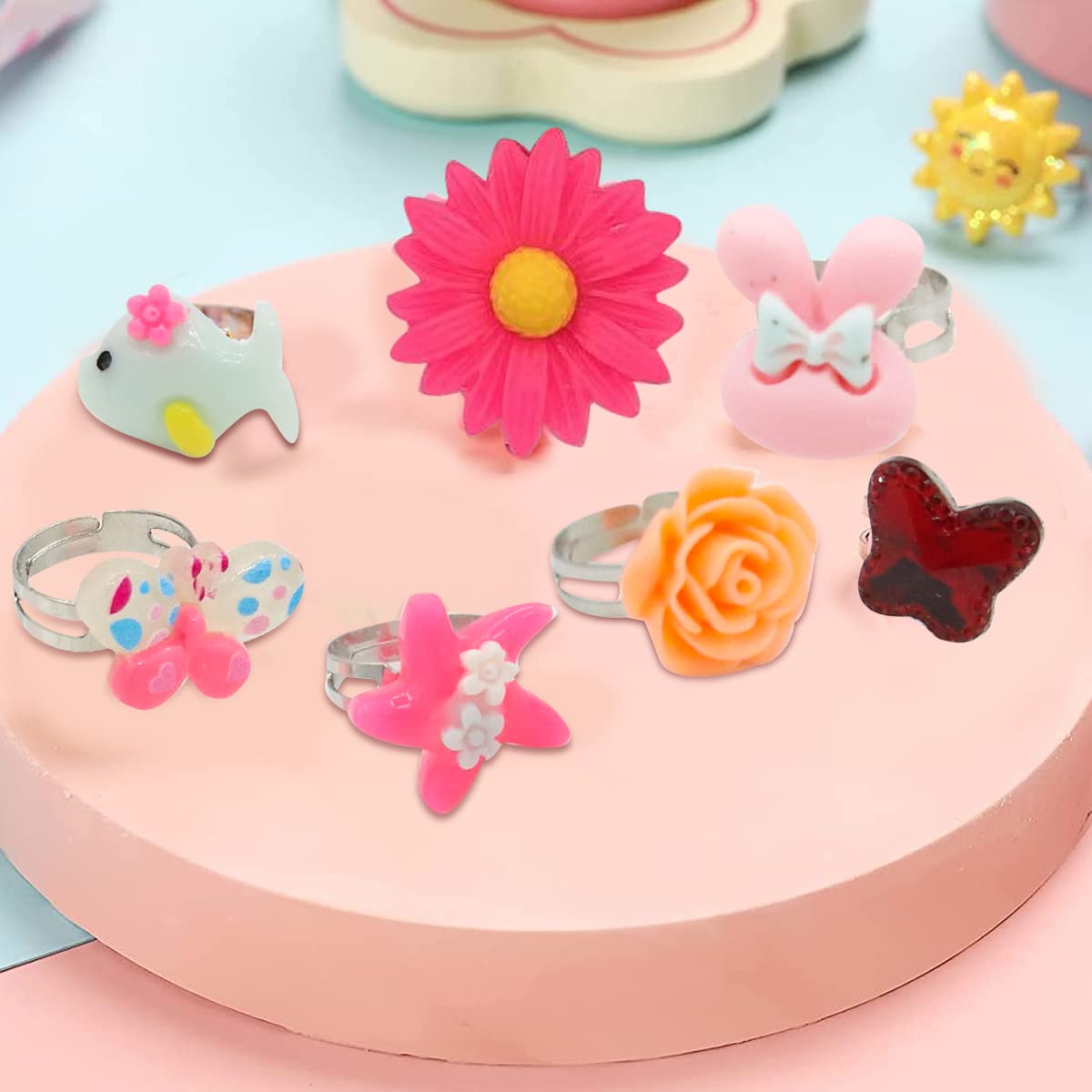 SANNIDHI 24pcs Combo Finger Rings for Girls Resin Cartoon Cute Ring Set for Girls Kids Pretend Play Dress Up, Adjustable Size Jewelry Rings with Gift Box SANNIDHI 24pcs Combo Finger Rings for Girls Resin Cartoon Cute Ring Set for Girls Kids Pretend Play Dress Up, Adjustable Size Jewelry Rings with Gift Box